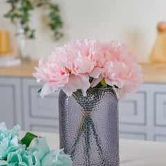 Artificial rose blooms